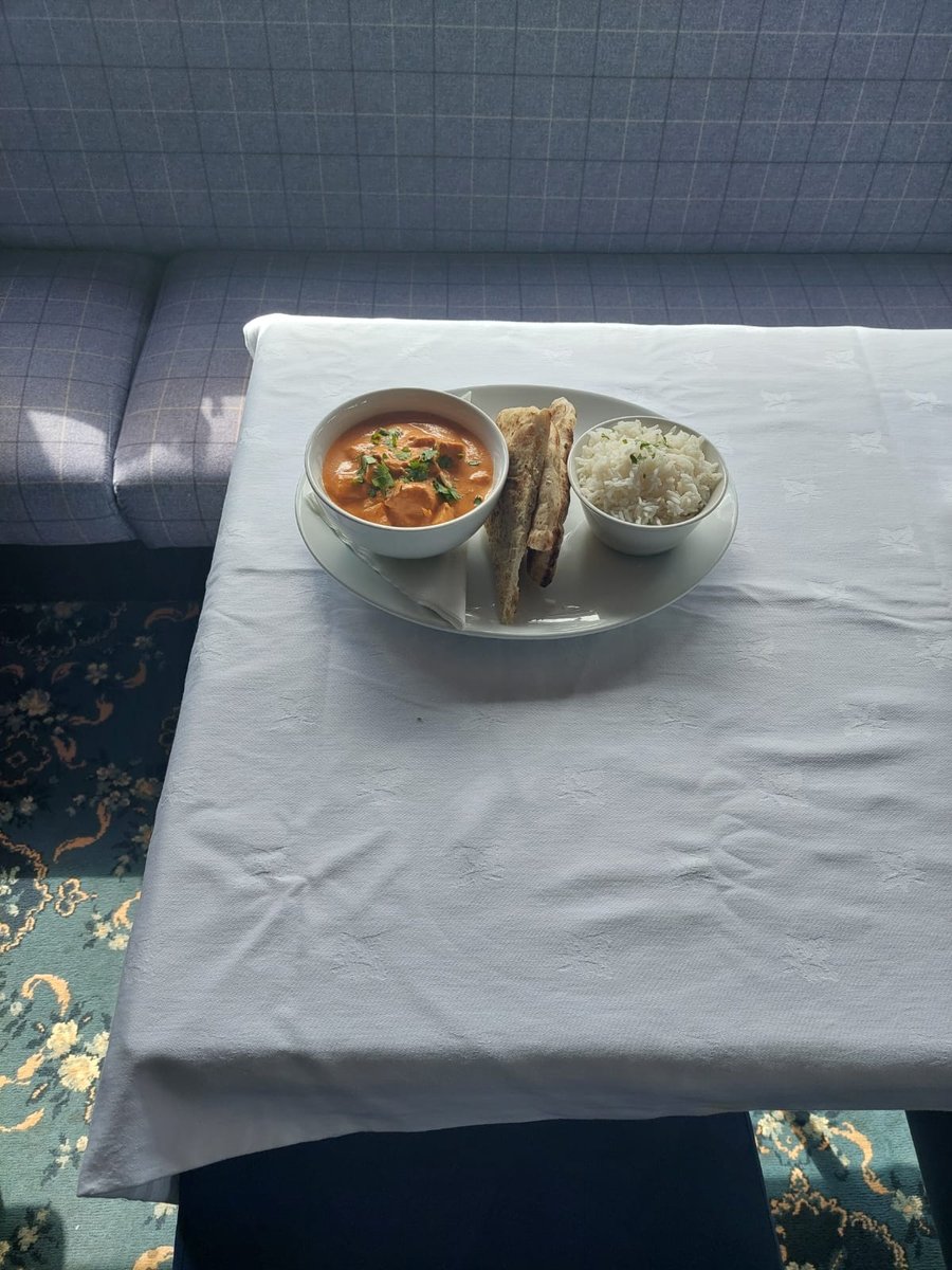 Freshly cooked chicken curry with rice and naan at TMT Café Bistro, Jedburgh Golf Club